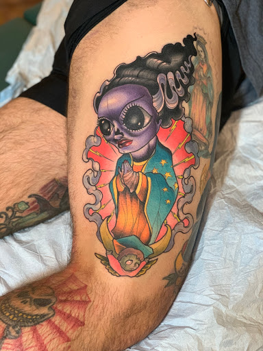 Explore swimming tattoo ideas, creative tattoo ideas in Tallmadge, available at Killjoy tattoo