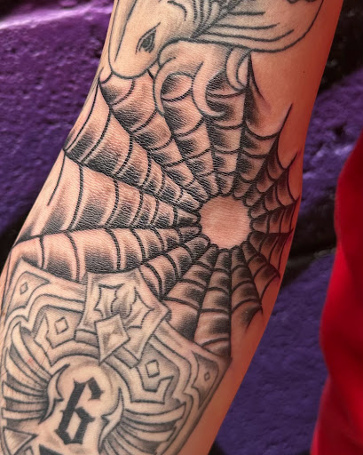 Explore floral arm sleeve tattoo ideas, creative tattoo ideas in Buffalo, available at True Gloom Tattoo Studio