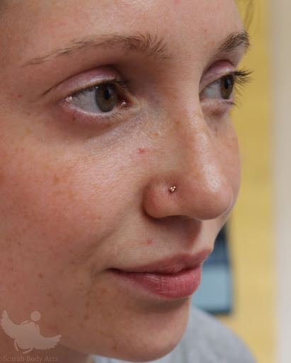 Explore rose tattoo ideas men, creative tattoo ideas in Syracuse, available at Scarab Body Arts