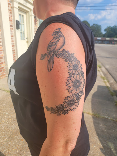 Explore snowmobile tattoo ideas, creative tattoo ideas in Ozark, available at Tooth & Nail Tattoo & Piercing