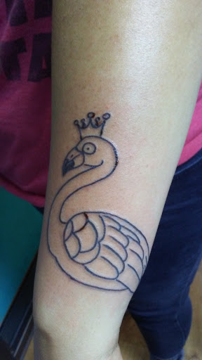 Explore child tattoo ideas for dad, creative tattoo ideas in Fort Worth, available at Randy Adams Tattoo Studio