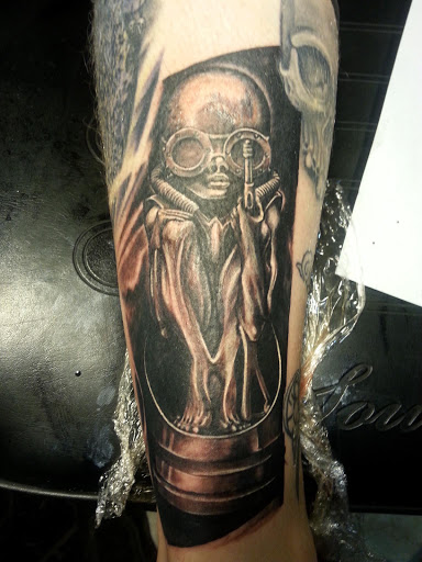 Explore astronomical tattoo ideas, creative tattoo ideas in Tucson, available at Sacred Art Tattoo Studio