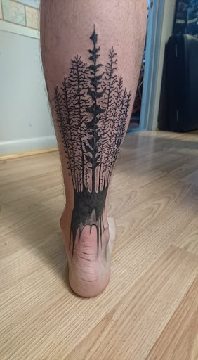 Explore mens back shoulder tattoo ideas, creative tattoo ideas in Jonesboro, available at Immortal Ink