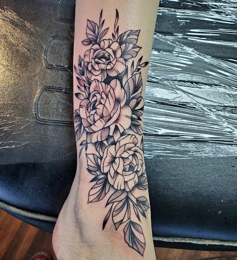 Explore tattoo ideas on the shoulder, creative tattoo ideas in Reno, available at Evolution Tattoo