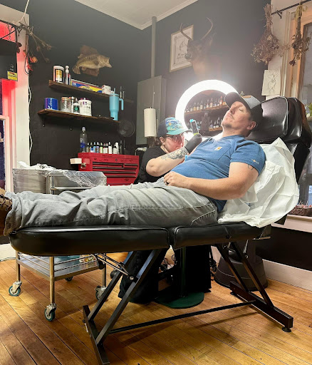 Explore small alice in wonderland tattoo ideas, creative tattoo ideas in Morrisville, available at All The Things Tattoo Studio