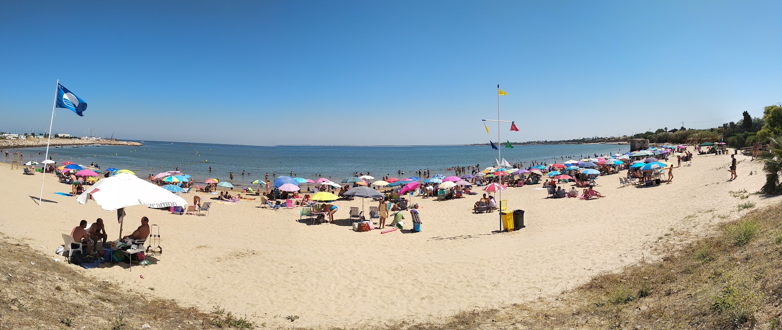 Fotografija Playa Micaela z svetel pesek površino
