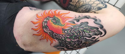 Explore small initial tattoo ideas, creative tattoo ideas in Toledo, available at 4 Nineteen Ink