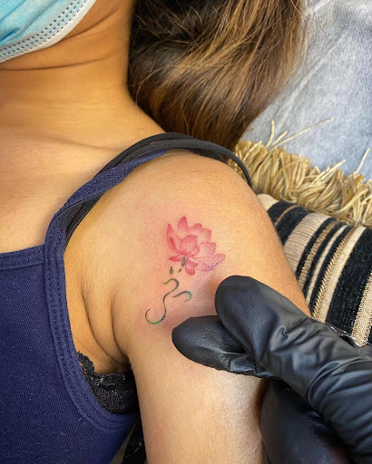 Explore pink ribbon tattoo ideas, creative tattoo ideas in Orange, available at Baron Art Tattoo