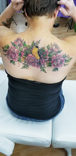 Explore t rex tattoo ideas, creative tattoo ideas in Benton, available at Spectrum Tattoo