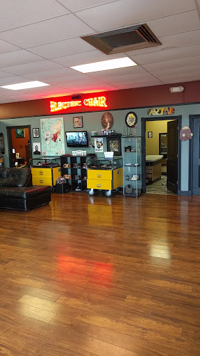 Explore black and grey realism tattoo ideas, creative tattoo ideas in Flint, available at Electric Chair Tattoo