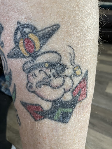 Explore cross tattoo ideas for men, creative tattoo ideas in Peoria, available at Freedom Ink Tattoos