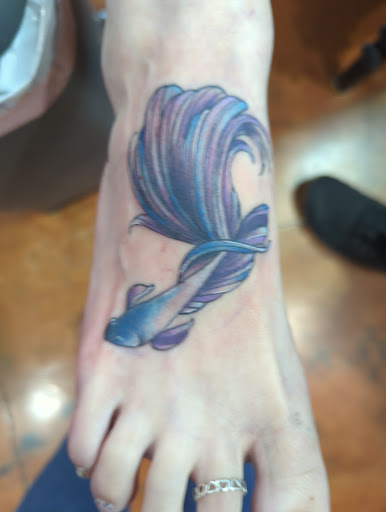 Explore tramp stamp tattoo ideas, creative tattoo ideas in Coeur D Alene, available at Jojos Tattoo & Body Piercing