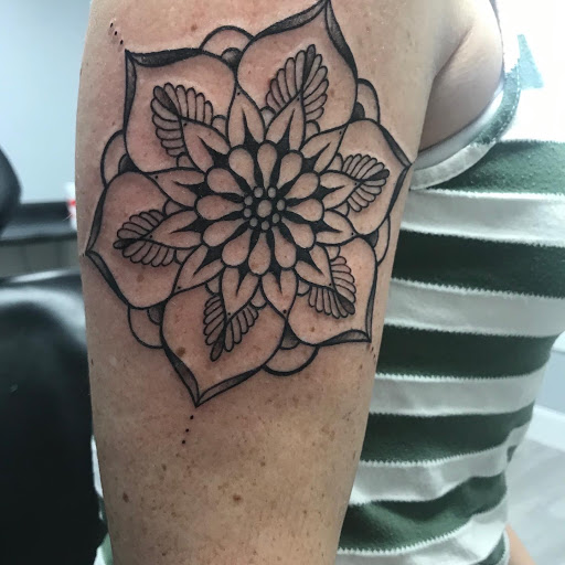 Explore one day at a time tattoo ideas, creative tattoo ideas in Wake Forest, available at Revelation Ink Tattoo and Piercing
