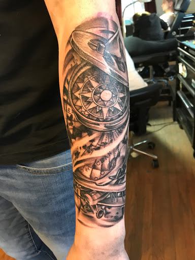 Explore skateboarding tattoo ideas, creative tattoo ideas in Milford, available at Golden Hammer Tattoo Studios