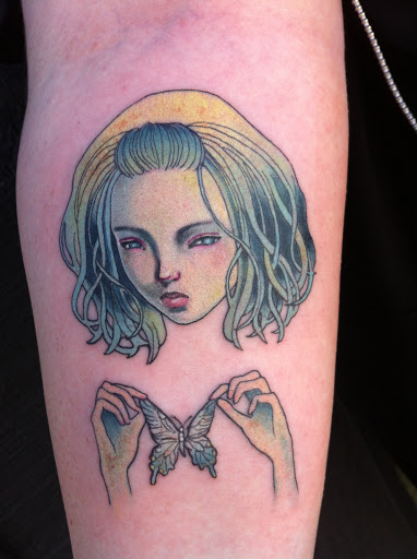 Find tattoos in between breast ideas for your next unique tattoo in Knoxville at Black Moth Collective Tattoo