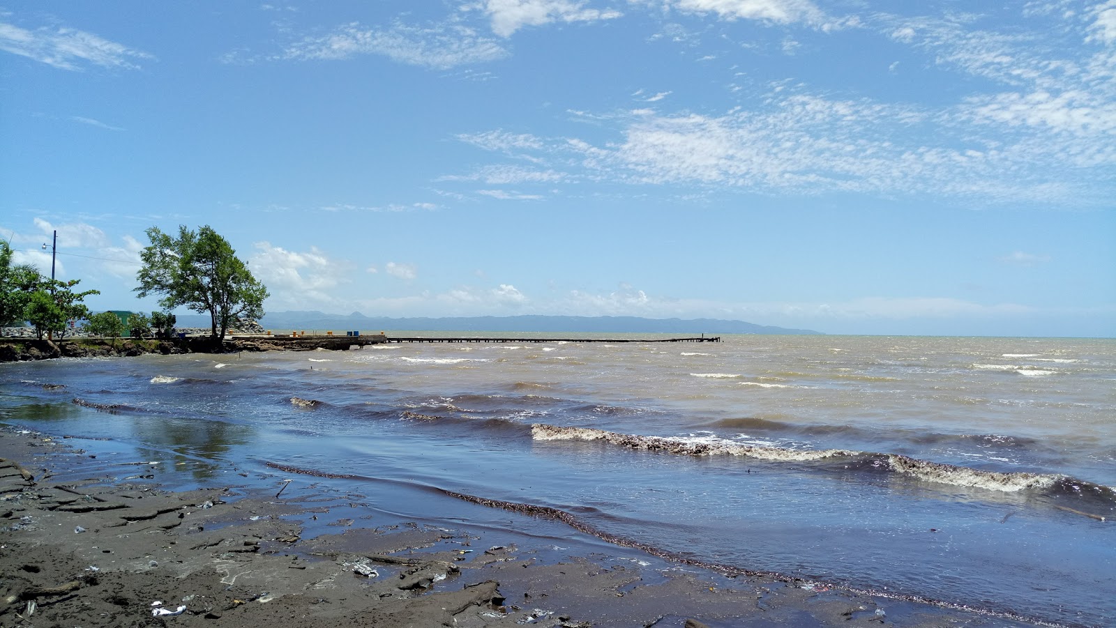 Playa Sabana de la Mar'in fotoğrafı geniş bir kıyı şeridi ile birlikte