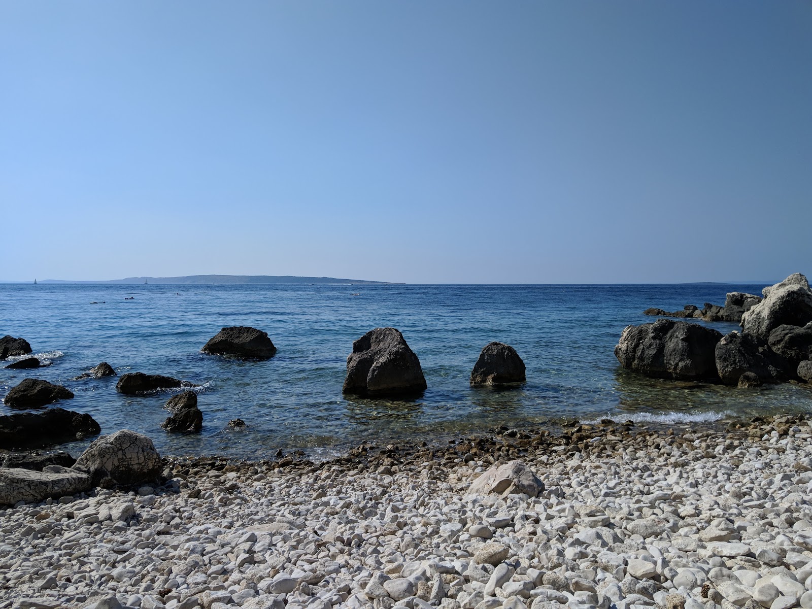 Foto di Kandarola II beach con una superficie del acqua cristallina