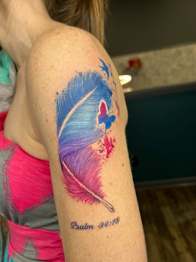 Explore black widow tattoo ideas, creative tattoo ideas in Goose Creek, available at Red Kirin Tattoo