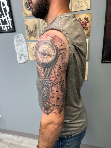 Explore dominican flag tattoo ideas, creative tattoo ideas in Waldorf, available at DRive Tattoos