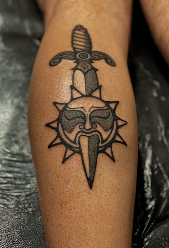 Explore red and black tattoo ideas, creative tattoo ideas in Ojai, available at Hanman Ink