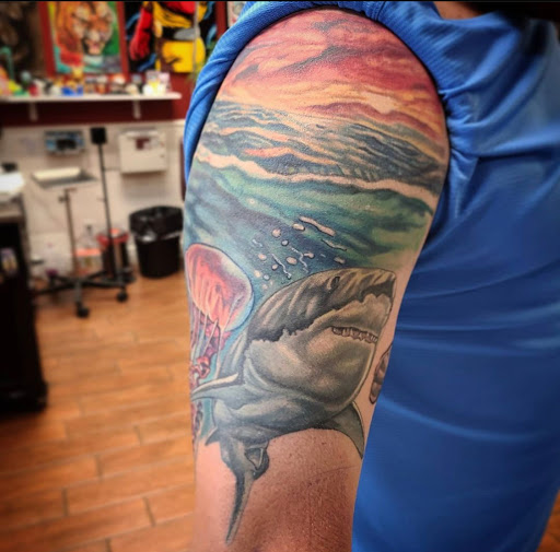 Explore mens rib tattoo ideas, creative tattoo ideas in Stuart, available at Tiger Shark Tattoo Studio