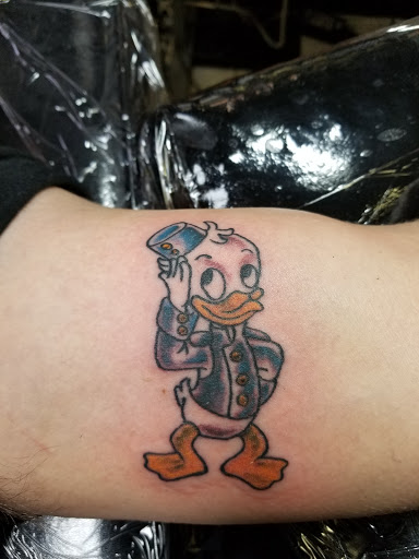 Explore key to my heart tattoo ideas, creative tattoo ideas in Powell, available at AVALON COVE TATTOO