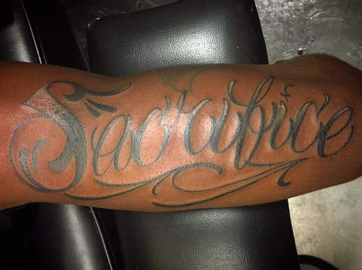 Explore waistline tattoo ideas, creative tattoo ideas in Savannah, available at Tatlyfe Studios