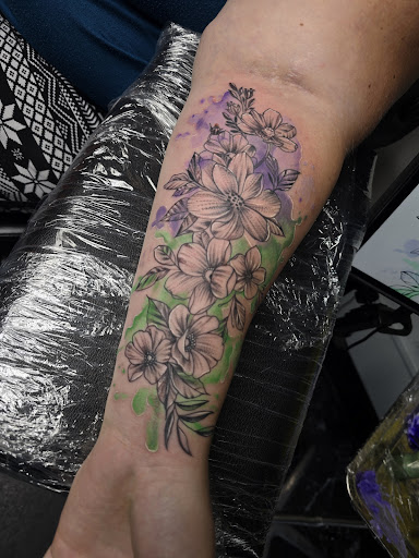 Explore salmon tattoo ideas, creative tattoo ideas in Debary, available at Divine Line Tattoos