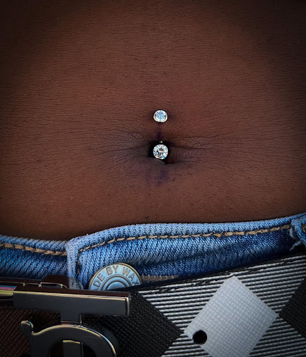 Find women's rib tattoo ideas for your next unique tattoo in Terre Haute at No Worries Tattoo