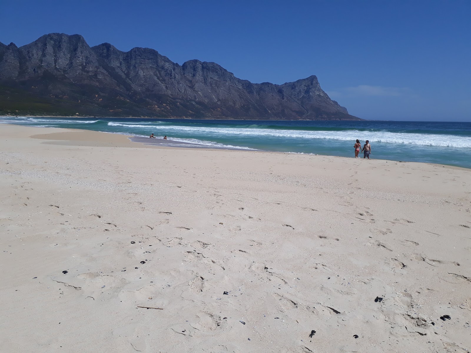 Photo of Kogel Bay beach backed by cliffs