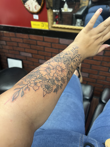 Explore stretch mark tattoo ideas, creative tattoo ideas in Covington, available at Arts Ink Tattoo Studio