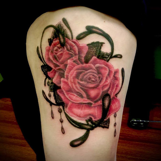 Explore chrome tattoo ideas, creative tattoo ideas in Springfield, available at Poke and a Rub art studio