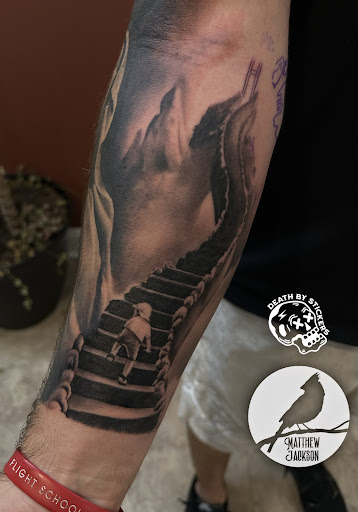 Explore kiss band tattoo ideas, creative tattoo ideas in Nashville, available at RedBird Tattoo