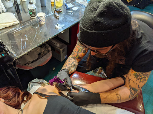 Explore tattoo ideas rib cage, creative tattoo ideas in Reno, available at Aces Tattoo