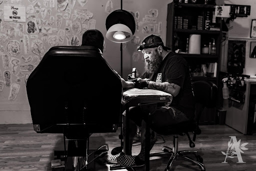 Explore wolf chest tattoo ideas, creative tattoo ideas in Waverly, available at Dark Circus Tattoo