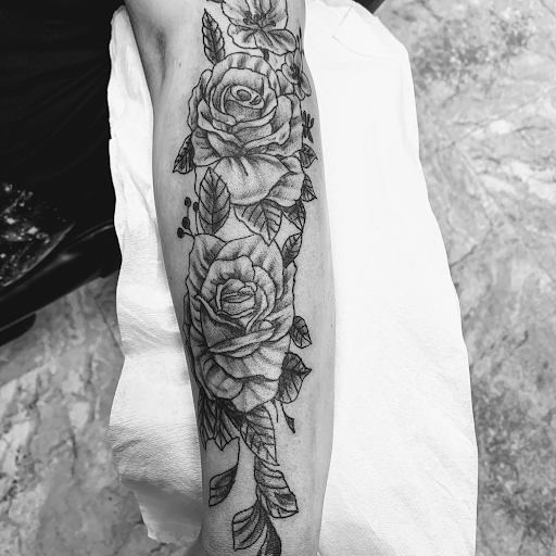 Explore patchwork tattoo ideas, creative tattoo ideas in Seymour, available at American Gypsy Tattoo Corp.