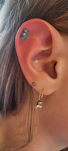 Explore initial finger tattoo ideas, creative tattoo ideas in Toledo, available at Artistik Tat2 and Body Piercing