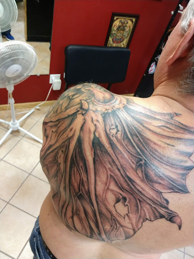 Explore lower back tattoo ideas for females, creative tattoo ideas in Rapid City, available at Convicted Designs Tattoo & Piercing
