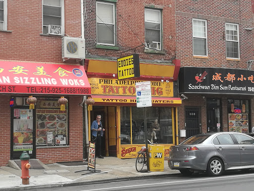 Explore cupid tattoo ideas, creative tattoo ideas in Philadelphia, available at Philadelphia Eddies Chinatown Tattoo