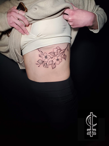 Explore crown tattoo ideas, creative tattoo ideas in Stevens Point, available at International Ink Tattoos
