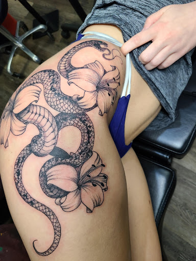 Explore butterfly foot tattoo ideas, creative tattoo ideas in Meadville, available at Lucky Lucys Tattoo and Art Studio