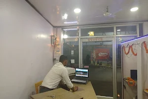 Kishor Auto Mobiles (Garage) & Aastha Cyber Cafe image