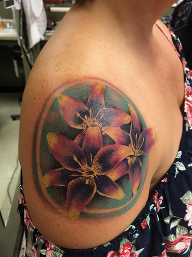 Explore rib tattoos for men ideas, creative tattoo ideas in Fargo, available at Golden Dragon Tattoo