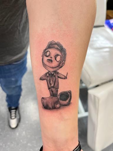 Explore front of neck tattoo ideas, creative tattoo ideas in La Vista, available at InkedUp Needles