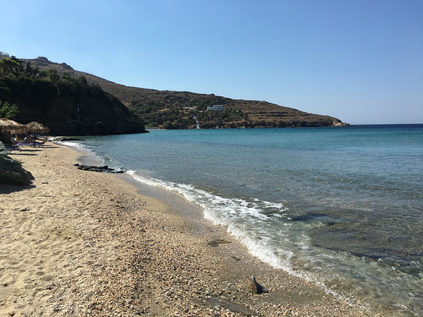 Photo of Delavoyas Beach with turquoise pure water surface