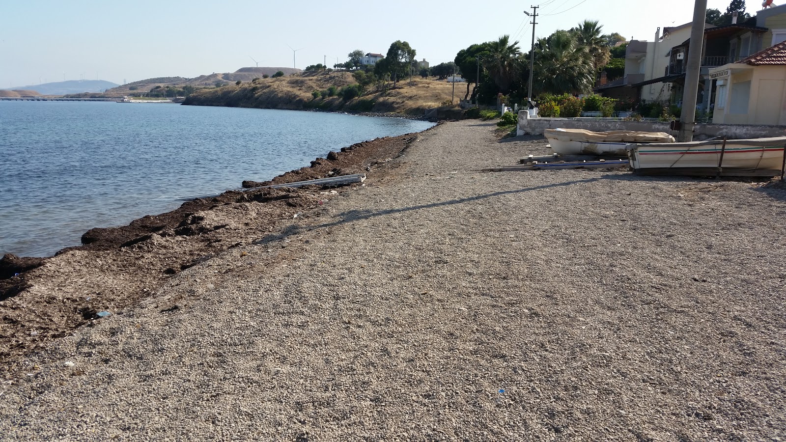 Valokuva Gencelli Sahilista. pinnalla turkoosi puhdas vesi:n kanssa