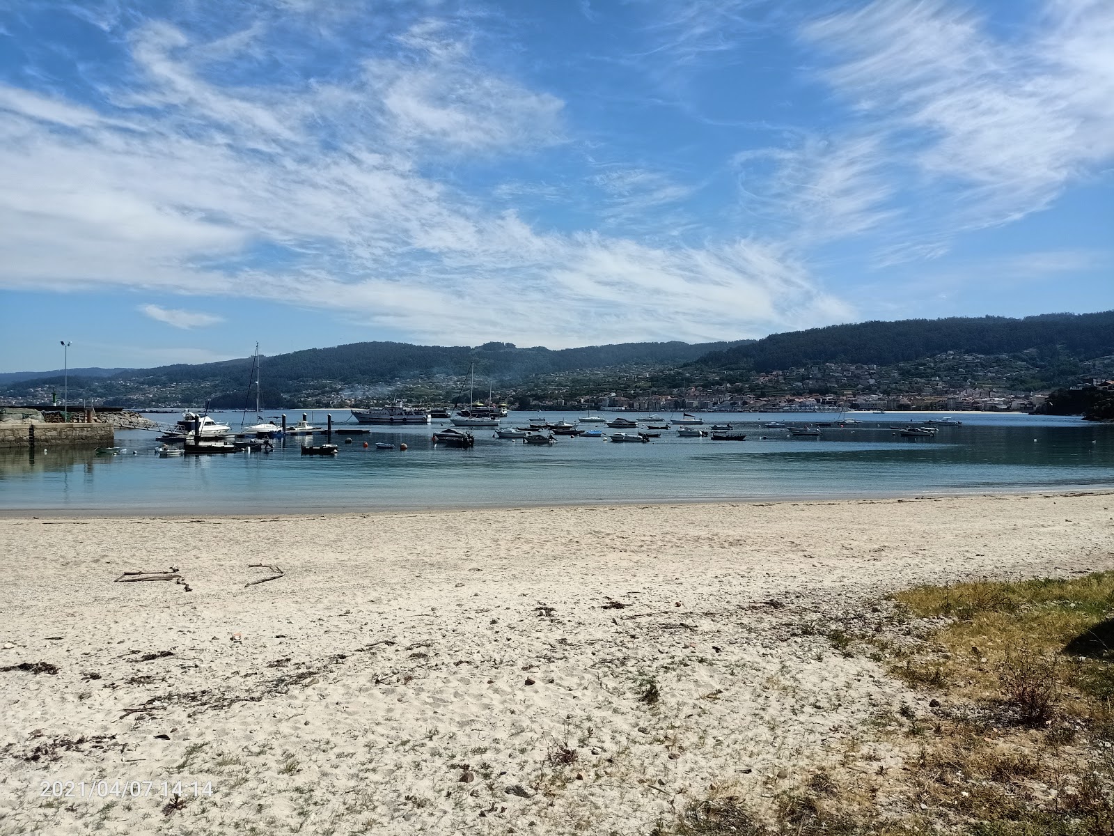 Foto av Praia de Beluso med turkos rent vatten yta