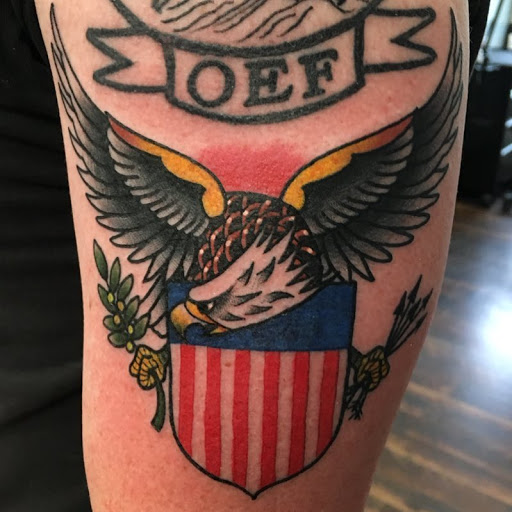 Explore boxing gloves tattoo ideas, creative tattoo ideas in Delmar, available at Resolute Tattoo