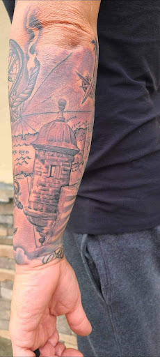 Find between the breast tattoo ideas for your next unique tattoo in Winston Salem at Inktellectuals Art Gallery