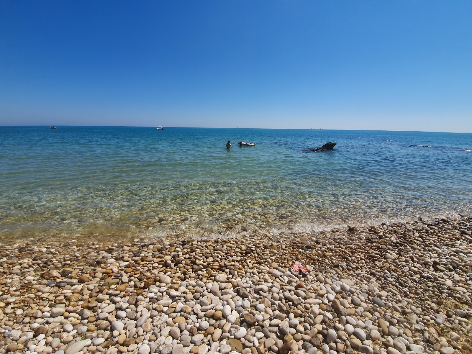 Foto av Spiaggia della Canale med rymliga multifack